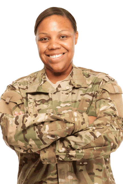 Photo of a smiling woman in fatigues.